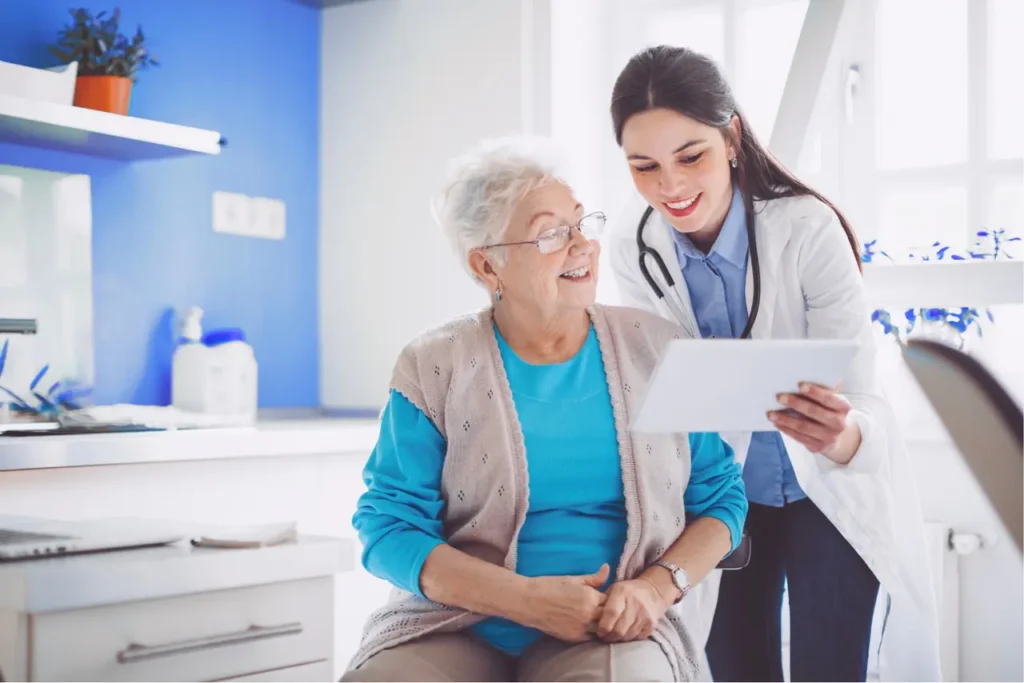 Patient reviewing healthcare costs and benefits during a concierge medicine visit